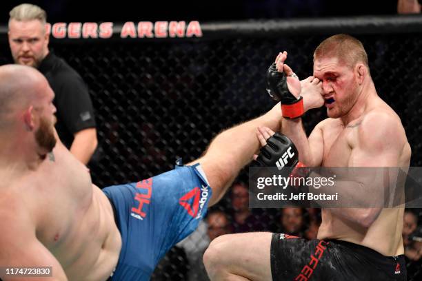 Jeff Hughes kicks Todd Duffee in their heavyweight bout during the UFC Fight Night event at Rogers Arena on September 14, 2019 in Vancouver, Canada.