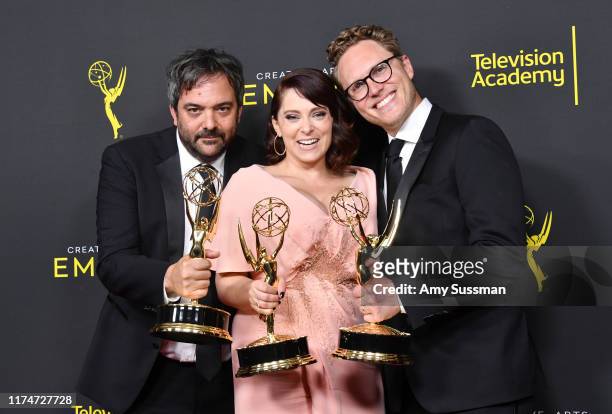 Adam Schlesinger, Rachel Bloom and Jack Dolgen pose with the Outstanding Original Music and Lyrics Award for 'Crazy Ex-Girlfriend' in the press room...