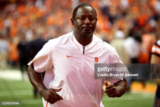 Head Coach Dino Babers of the Syracuse Orange runs off the field during a game against the Clemson Tigers at the Carrier Dome on September 14, 2019...