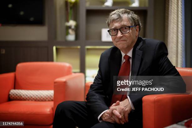 Microsoft founder, Co-Chairman of the Bill & Melinda Gates Foundation, Bill Gates, poses for a picture on October 9 in Lyon, central eastern France,...