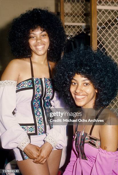 Charmaine Sylvers and sister Olympia Sylvers of the R and B group The Sylvers backstage before a concert at the Forum on July 17,1973 in Inglewood,...