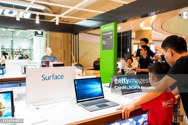 Microsoft Surface computers at a Microsoft retail store in Guangzhou.