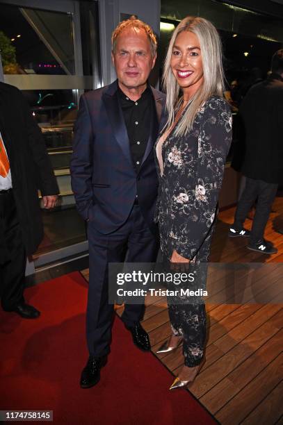 Uwe Ochsenknecht and his wife Kirsten Kiki Viebrock attend the world premiere of the movie "Ich war noch niemals in New York" at Cinedom on October...