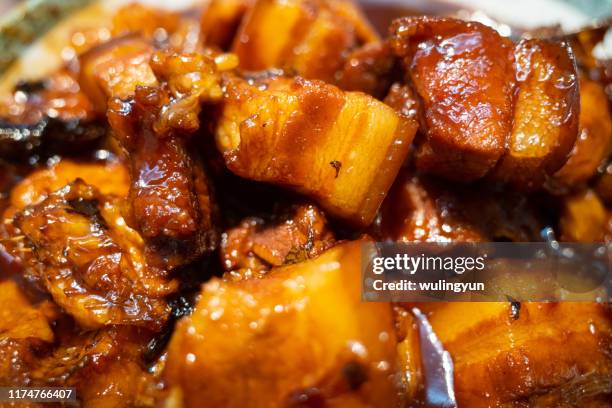 homemade braised pork in brown sauce - braised stock pictures, royalty-free photos & images