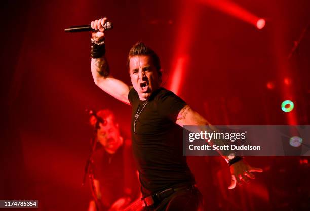 Singer Scott Stapp, founding member of Creed, performs onstage during the "Space Between the Shadows" album tour at The Canyon Club on September 14,...