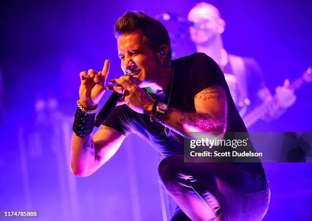 Singer Scott Stapp, founding member of Creed, performs onstage during the "Space Between the Shadows" album tour at The Canyon Club on September 14,...