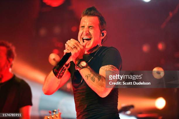 Singer Scott Stapp, founding member of Creed, performs onstage during the "Space Between the Shadows" album tour at The Canyon Club on September 14,...