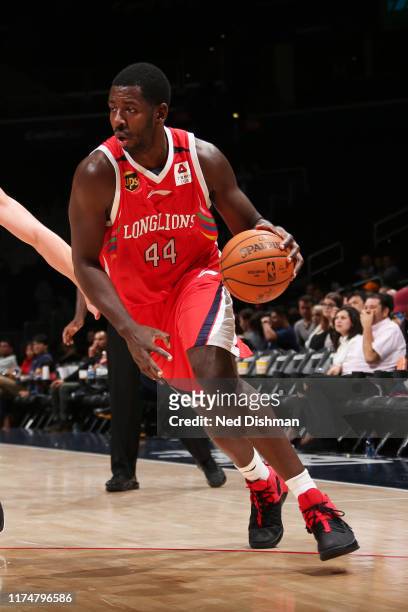 Andrew Nicholson of the Guangzhou Long Lions handles the ball against the Washington Wizards during a pre-season game on October 9, 2019 at Capital...
