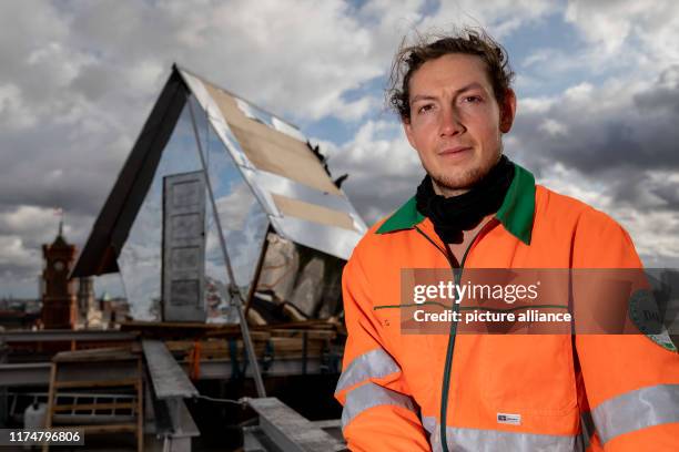 September 2019, Berlin: Jakob Wirth, artist and sociology student, sits on the roof of a residential building near Alexanderplatz in front of the...