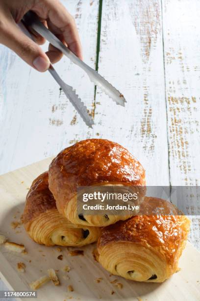 pain au chocolate pastry - pain au chocolat stock pictures, royalty-free photos & images