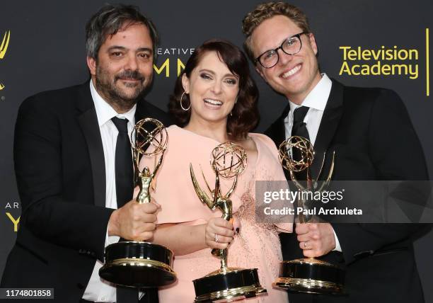 Adam Schlesinger, Rachel Bloom and Jack Dolgen pose for photos in the press room for the 2019 Creative Arts Emmy Awards on September 14, 2019 in Los...