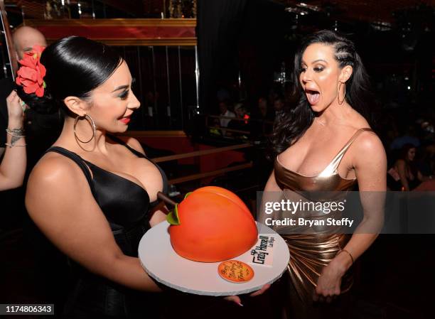 Birthday cake is presented to adult film actress Kendra Lust during her birthday celebration at the Crazy Horse 3 Gentlemen's Club on September 14,...