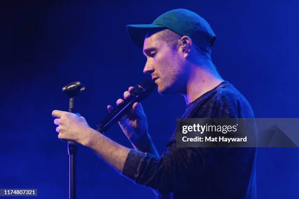 Dan Smith of Bastille performs on stage at WaMu Theater on October 9, 2019 in Seattle, Washington.