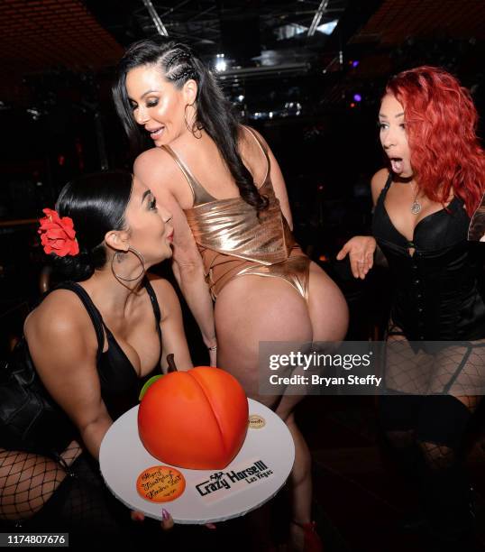 Birthday cake is presented to adult film actress Kendra Lust during her birthday celebration at the Crazy Horse 3 Gentlemen's Club on September 14,...