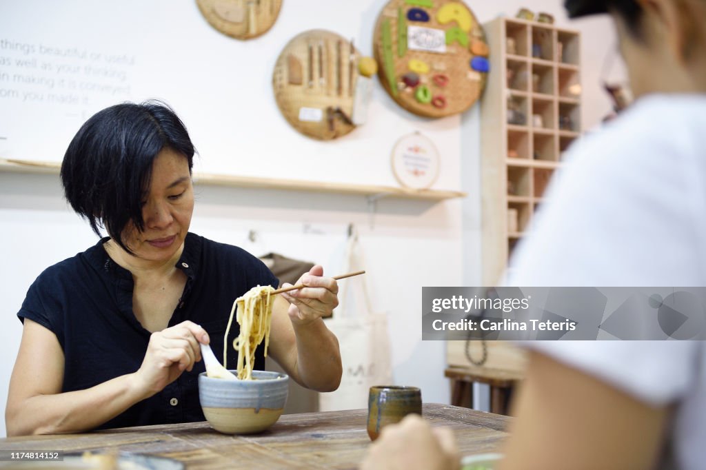 Colleagues eating lunch in their work studio