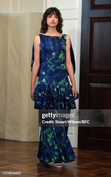 Model walks the runway at the Osman show during London Fashion Week September 2019 on September 15, 2019 in London, England.