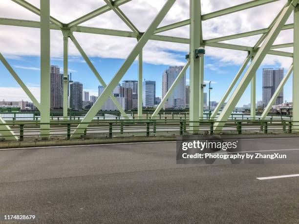 tokyo skyline at day time. - tsukishima tokyo stock pictures, royalty-free photos & images