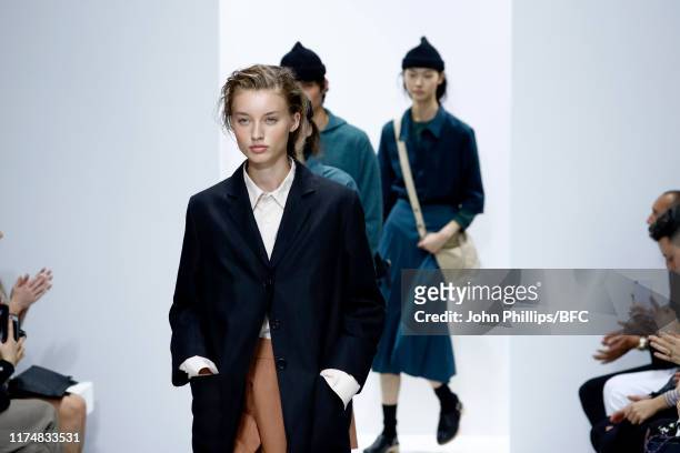Models walk the runway at the Margaret Howell show during London Fashion Week September 2019 at Rambert on September 15, 2019 in London, England.