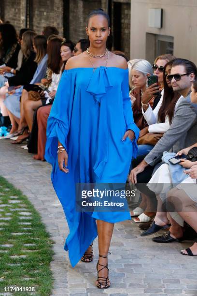 Model walks the runway at the Roland Mouret show during London Fashion Week September 2019 on September 15, 2019 in London, England.