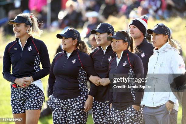 The USA team watch the action on the eighteenth hole during the final day singles matches of the Solheim Cup at Gleneagles on September 15, 2019 in...