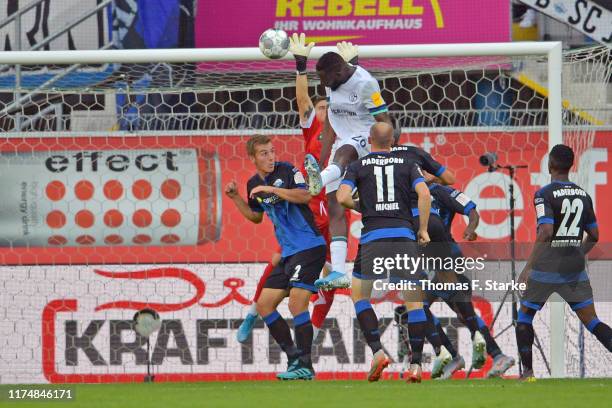 Salif Sane of Schalke scores his teams first goal during the Bundesliga match between SC Paderborn 07 and FC Schalke 04 at Benteler Arena on...