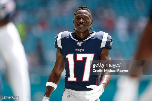 Wide Receiver Antonio Brown of the New England Patriots warms up prior to the game against the Miami Dolphins at Hard Rock Stadium on September 15,...