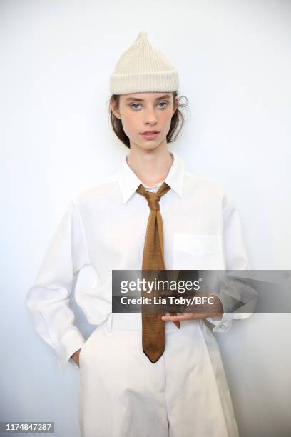 Model backstage ahead of the Margaret Howell show during London Fashion Week September 2019 at Rambert on September 15, 2019 in London, England.