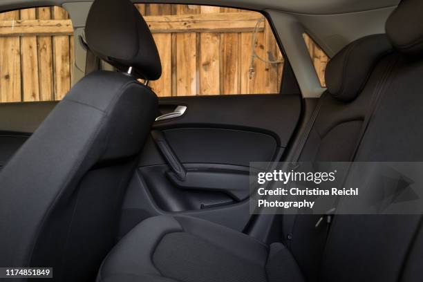 interior shot of backseat of new car - car interior no people stock pictures, royalty-free photos & images