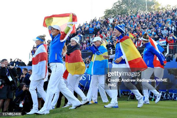 Team Europe celebrate winning the Solheim Cup during the final day singles matches of the Solheim Cup at Gleneagles on September 15, 2019 in...