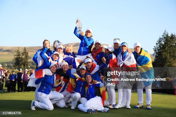 Team Europe celebrate winning the Solheim Cup during the final day singles matches of the Solheim Cup at Gleneagles on September 15, 2019 in...