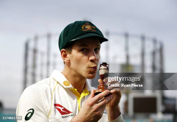 Tim Paine of Australia celebrates with the Urn after Australian drew the series to retain the Ashes during day four of the 5th Specsavers Ashes Test...