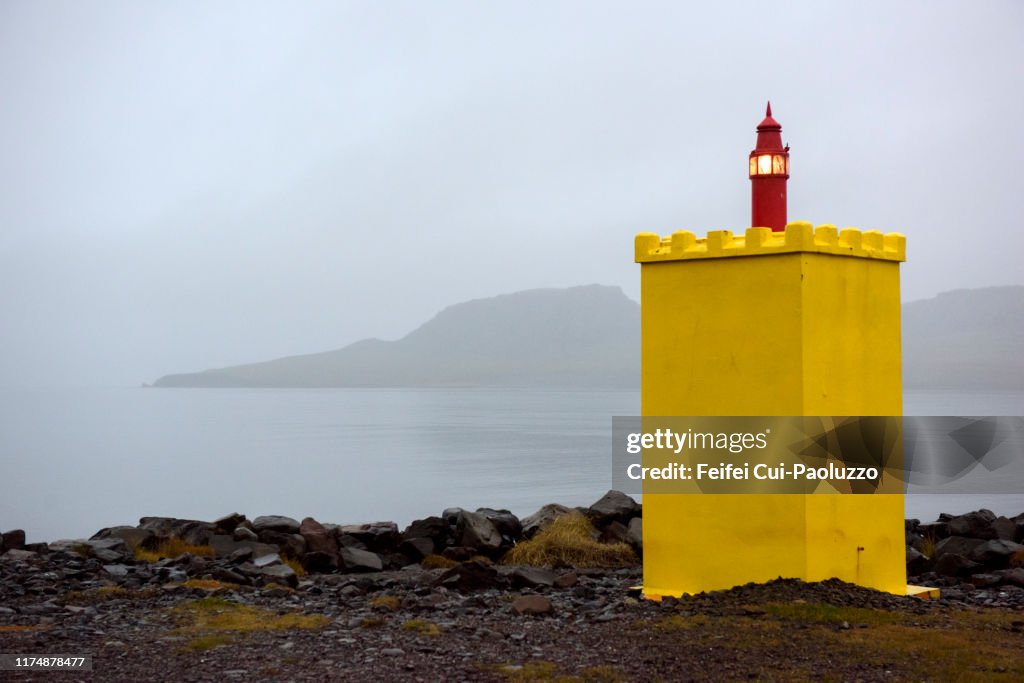Lighthouse at fjord of Eskifjörður, Iceland