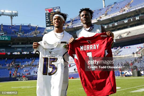 Wide Receiver Marquise Brown of the Baltimore Ravens trades jerseys with quarterback Kyler Murray of the Arizona Cardinals after the Baltimore Ravens...