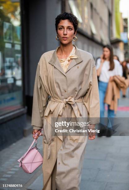 Yasmin Sewell is seen wearing two tone trench coat outside Rejina Pyo during London Fashion Week September 2019 on September 14, 2019 in London,...