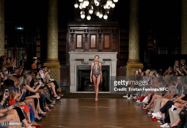 Model walks the runway at the AADNEVIK show during London Fashion Week September 2019 at The Royal Horseguards on September 15, 2019 in London,...