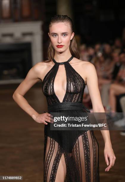 Model walks the runway at the AADNEVIK show during London Fashion Week September 2019 at The Royal Horseguards on September 15, 2019 in London,...