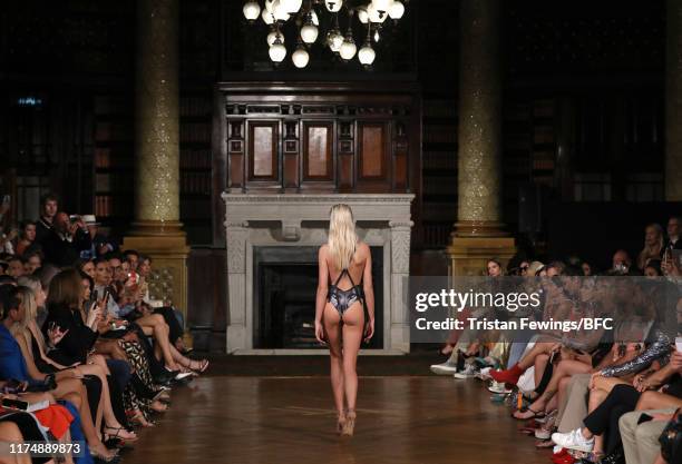 Model walks the runway at the AADNEVIK show during London Fashion Week September 2019 at The Royal Horseguards on September 15, 2019 in London,...