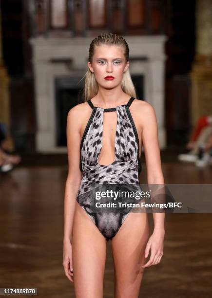 Model walks the runway at the AADNEVIK show during London Fashion Week September 2019 at The Royal Horseguards on September 15, 2019 in London,...