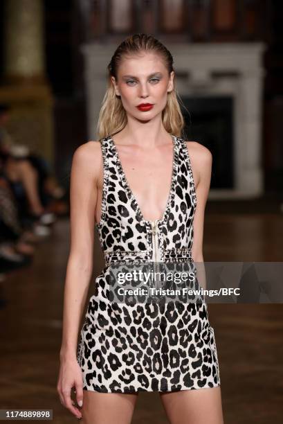 Model walks the runway at the AADNEVIK show during London Fashion Week September 2019 at The Royal Horseguards on September 15, 2019 in London,...