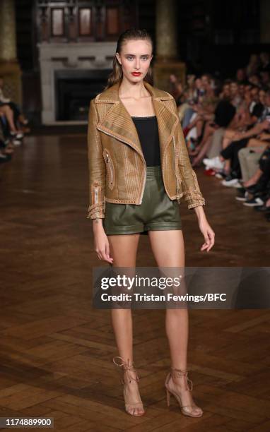 Model walks the runway at the AADNEVIK show during London Fashion Week September 2019 at The Royal Horseguards on September 15, 2019 in London,...