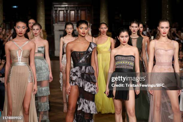 Models walk the runway at the AADNEVIK show during London Fashion Week September 2019 at The Royal Horseguards on September 15, 2019 in London,...