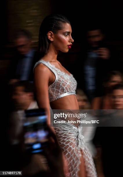 Model backstage at the AADNEVIK show during London Fashion Week September 2019 at The Royal Horseguards on September 15, 2019 in London, England.