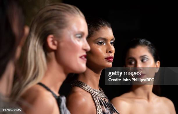 Models backstage at the AADNEVIK show during London Fashion Week September 2019 at The Royal Horseguards on September 15, 2019 in London, England.