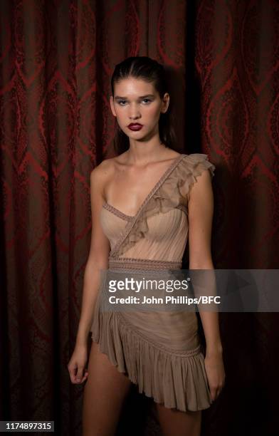 Model backstage at the AADNEVIK show during London Fashion Week September 2019 at The Royal Horseguards on September 15, 2019 in London, England.