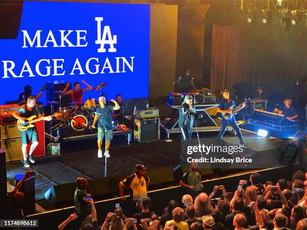 Tom Morello, Tim Commerford, Brad Wilk, Chuck D, B-Real, and DJ Lord perform in Prophets of Rage for hometown crowd before projection of MAKE LA RAGE...