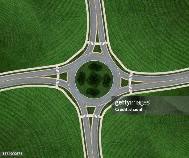 simetria da rotunda - junção de rua ou estrada - fotografias e filmes do acervo