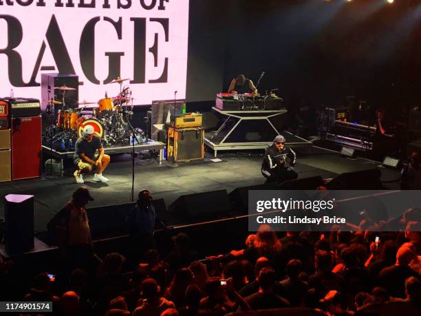 Real tells the audience to get down low, that everyone around the world has gotten down low and L.A. Can, too, in a quiet moment before he, Chuck D,...