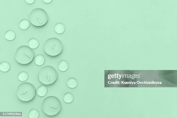 spa composition with candles, sea salt and flowers on white wooden background. - white rose flower spa photos et images de collection