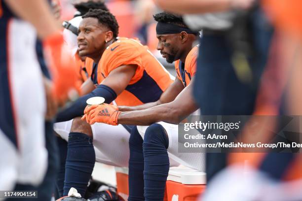 Emmanuel Sanders of the Denver Broncos reacts to being the target of a pass in the enzone from Joe Flacco that was intercepted by Kyle Fuller of the...