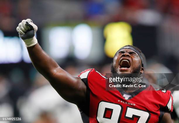 Grady Jarrett of the Atlanta Falcons reacts after a video review confirmed the Philadelphia Eagles failed to convert a fourth down in the final...